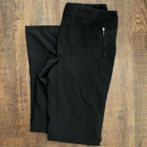 Trousers with zipper pockets.